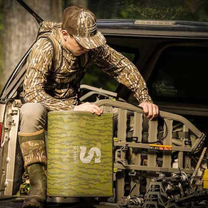 Hunter-on-Tailgate-with-Treestand-safety