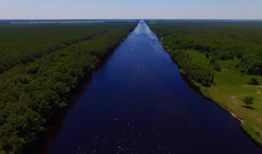 Photo of UNDER CONTRACT!  9 Acres of Waterfront Land with House For Sale in Hyde County NC!
