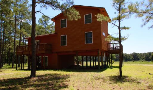 Photo of UNDER CONTRACT!  9 Acres of Waterfront Land with House For Sale in Hyde County NC!
