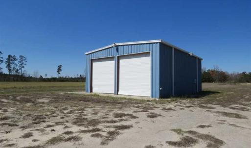Photo of REDUCED!  14.76 Acres of Farm Land With Shop Buildings For Sale in Columbus County NC!