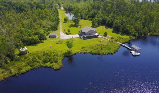 Photo of UNDER CONTRACT!  Waterfront Home with 11 Acres of Land For Sale in Tyrrell County NC!