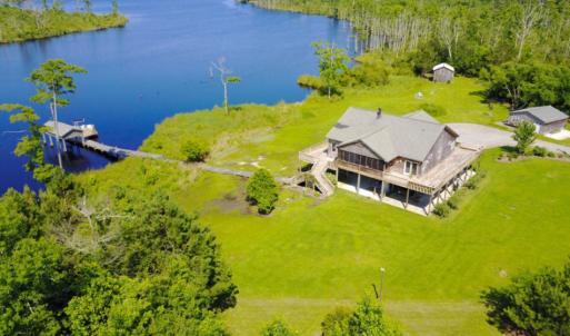 Photo of UNDER CONTRACT!  Waterfront Home with 11 Acres of Land For Sale in Tyrrell County NC!