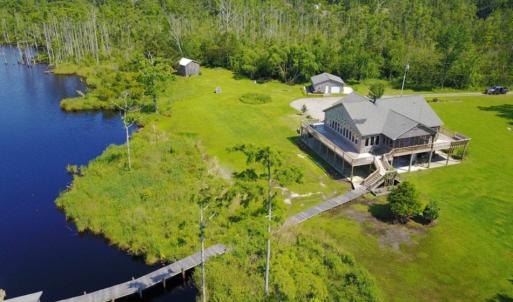 Photo of UNDER CONTRACT!  Waterfront Home with 11 Acres of Land For Sale in Tyrrell County NC!