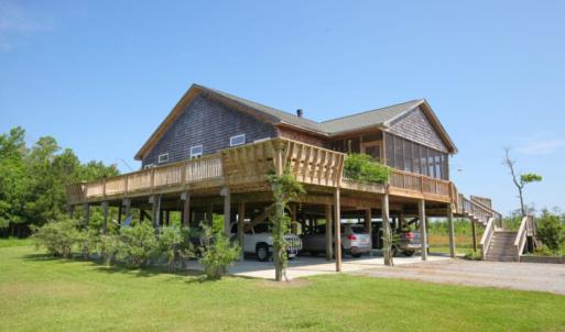 Photo of UNDER CONTRACT!  Waterfront Home with 11 Acres of Land For Sale in Tyrrell County NC!