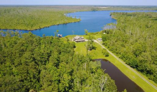 Photo of UNDER CONTRACT!  Waterfront Home with 11 Acres of Land For Sale in Tyrrell County NC!