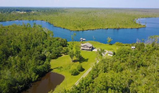 Photo of UNDER CONTRACT!  Waterfront Home with 11 Acres of Land For Sale in Tyrrell County NC!