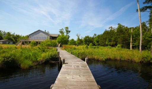 Photo of UNDER CONTRACT!  Waterfront Home with 11 Acres of Land For Sale in Tyrrell County NC!
