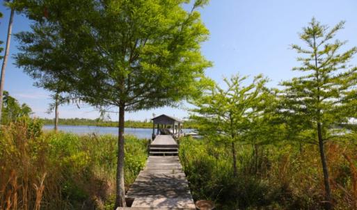 Photo of UNDER CONTRACT!  Waterfront Home with 11 Acres of Land For Sale in Tyrrell County NC!