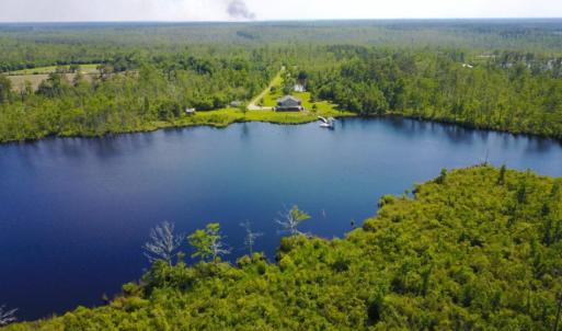 Photo of UNDER CONTRACT!  Waterfront Home with 11 Acres of Land For Sale in Tyrrell County NC!
