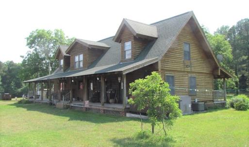 Photo of UNDER CONTRACT!  55 Acres of Farm Land with Log Home For Sale in Suffolk County VA!