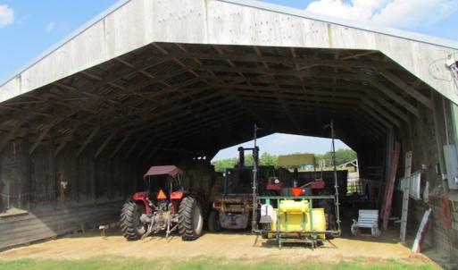 Photo of UNDER CONTRACT!  55 Acres of Farm Land with Log Home For Sale in Suffolk County VA!
