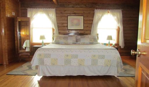 Photo of UNDER CONTRACT!  55 Acres of Farm Land with Log Home For Sale in Suffolk County VA!