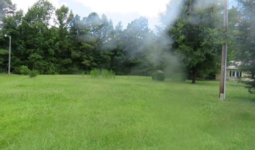 Photo of UNDER CONTRACT!  0.74 Acres with House and Separate Lot For Sale in Columbus County NC!