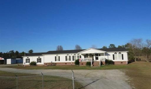 Photo of SOLD!!  8.32 Acres of Commercial and Development Land with Home in Columbus NC!