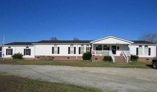 Photo of SOLD!!  8.32 Acres of Commercial and Development Land with Home in Columbus NC!