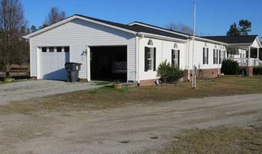Photo of SOLD!!  8.32 Acres of Commercial and Development Land with Home in Columbus NC!
