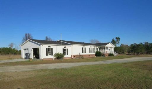 Photo of SOLD!!  8.32 Acres of Commercial and Development Land with Home in Columbus NC!