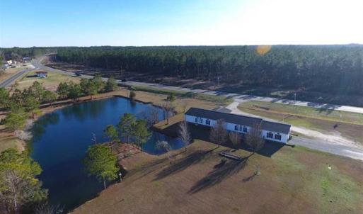 Photo of SOLD!!  8.32 Acres of Commercial and Development Land with Home in Columbus NC!