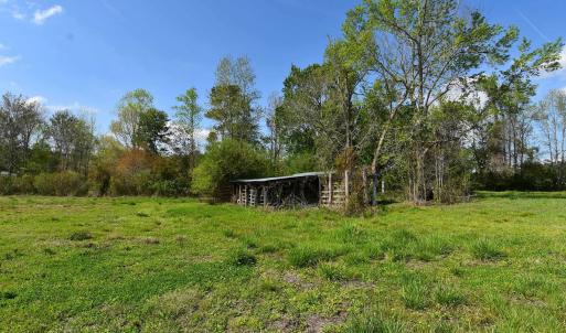 View of yard featuring an outbuilding and an outdo