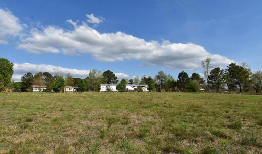 View of yard with a rural view