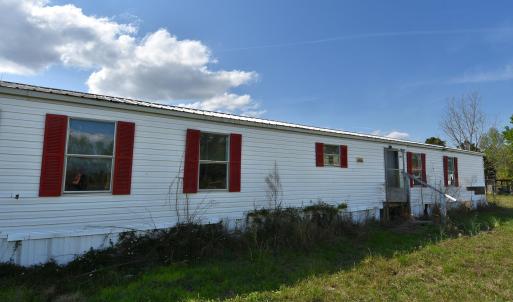 View of front facade with metal roof