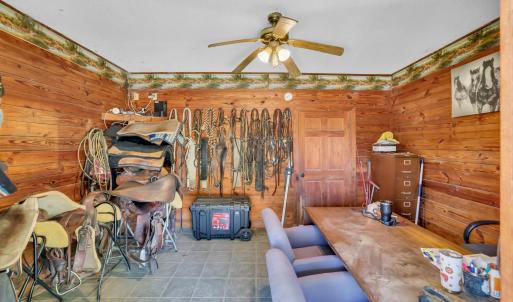 Interior space featuring a ceiling fan