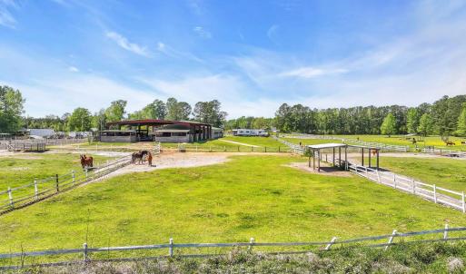 View of yard featuring an exterior structure, an o