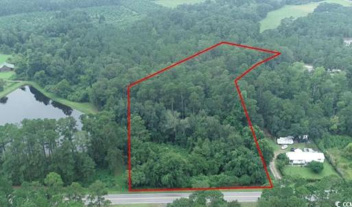 Aerial view of property and surrounding area featu