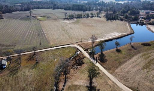 Overview of rural landscape featuring a nearby bod