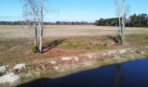 View of yard with a rural view