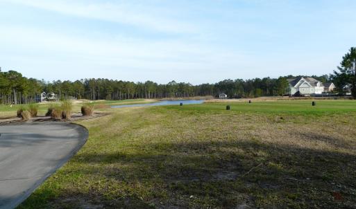 VIEW OF TEE BOX & WATER