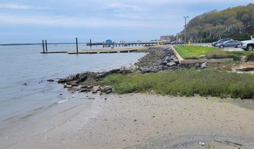 adjacent to the boat ramp