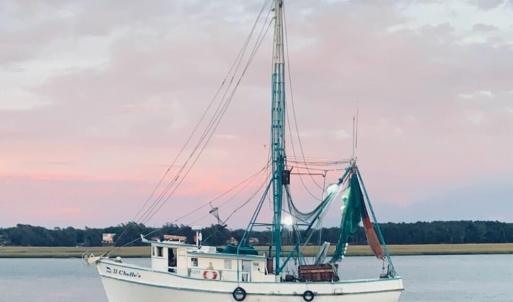 Shrimp Boat heading up Shallotte River