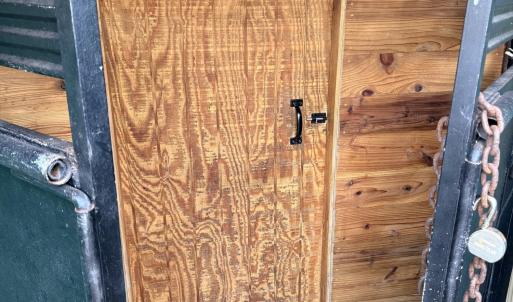 INSIDE TRAILER DOOR TO BED