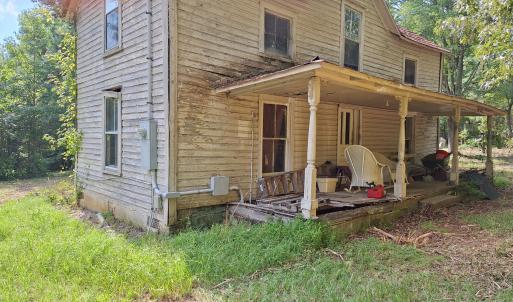 HOUSE FRONT AND PORCH AFTER CLEAN UP
