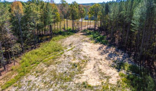 Cleared acreage towards back of property