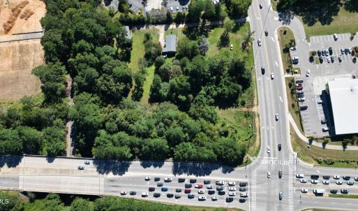 Overhead with traffic stacked on hwy 98