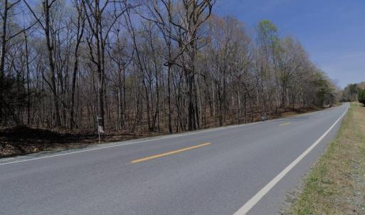 Aerial S POV Ground Bass Mountain Road