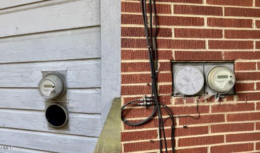Electric meters on ranch homes