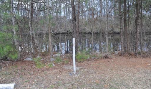 SW lot corner next to Canal marked near Post