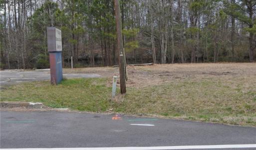 SE lot corner with Canal view in rear