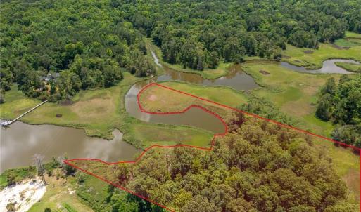 WATERFRONT - 1100+/-FEET OF FRONTAGE. GREAT SPOT TO PUT A PIER AND BE READY TO GO FISHING OR BOATING FROM YOUR BACKYARD.