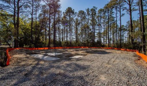 Quick picture of a new home being built on the same road...two lots down from this one! This street is ready for your new home as well!!