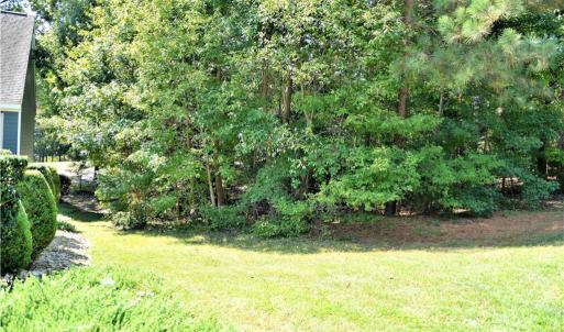 Lot line on left next to house and front of lot