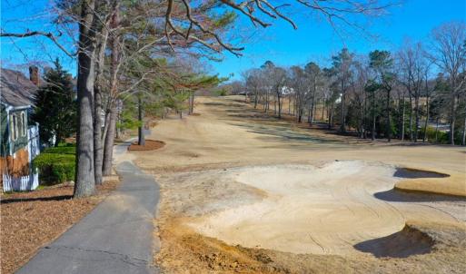View down the cart path towards the clubhouse