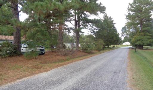 LOT NEAR HOUSES, PAVED ROADS