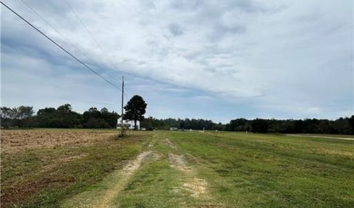 Private driveway spans the entire length of the property.