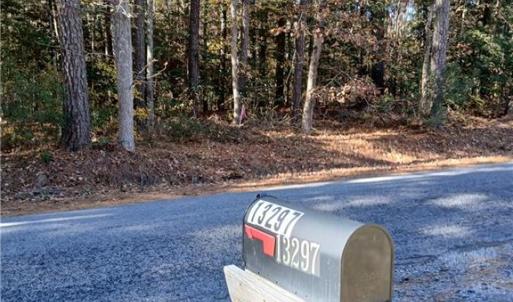 13297 Old Forty Rd is directly across the road from the wooded area