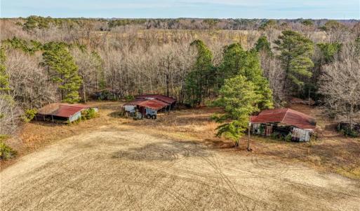 Old ball field area & buildings behind the driveway 1 access to property