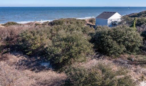 Four Bayfront lots for a total frontage of 200' x 150' depth.